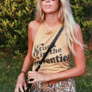 Brokedown clothing stuck in the 70’s tank